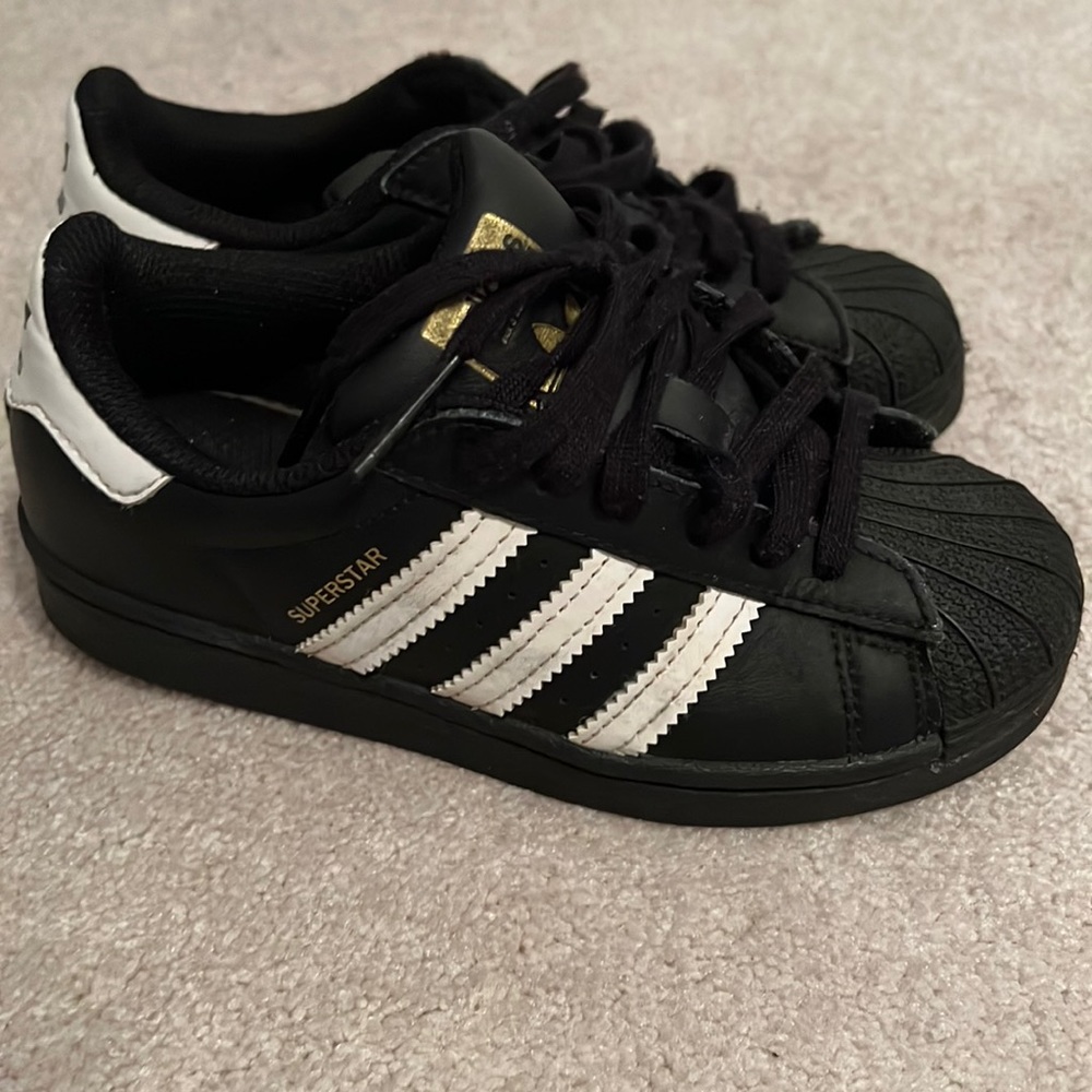 Boys Adidas Superstars.